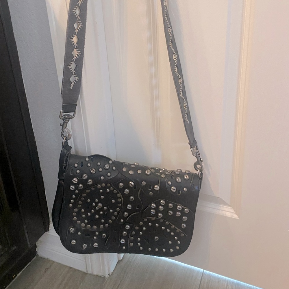 Patricia nash. used it just a few times. No bag.  No stains. Smoke free.